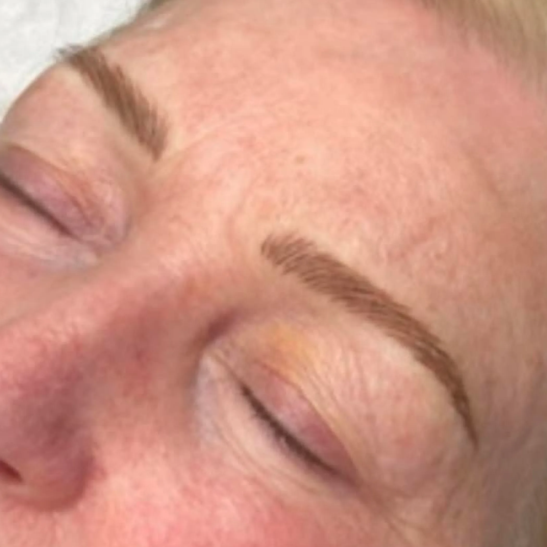natural microbladed blonde eyebrows close-up